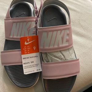 Women’s pink Nike sandals